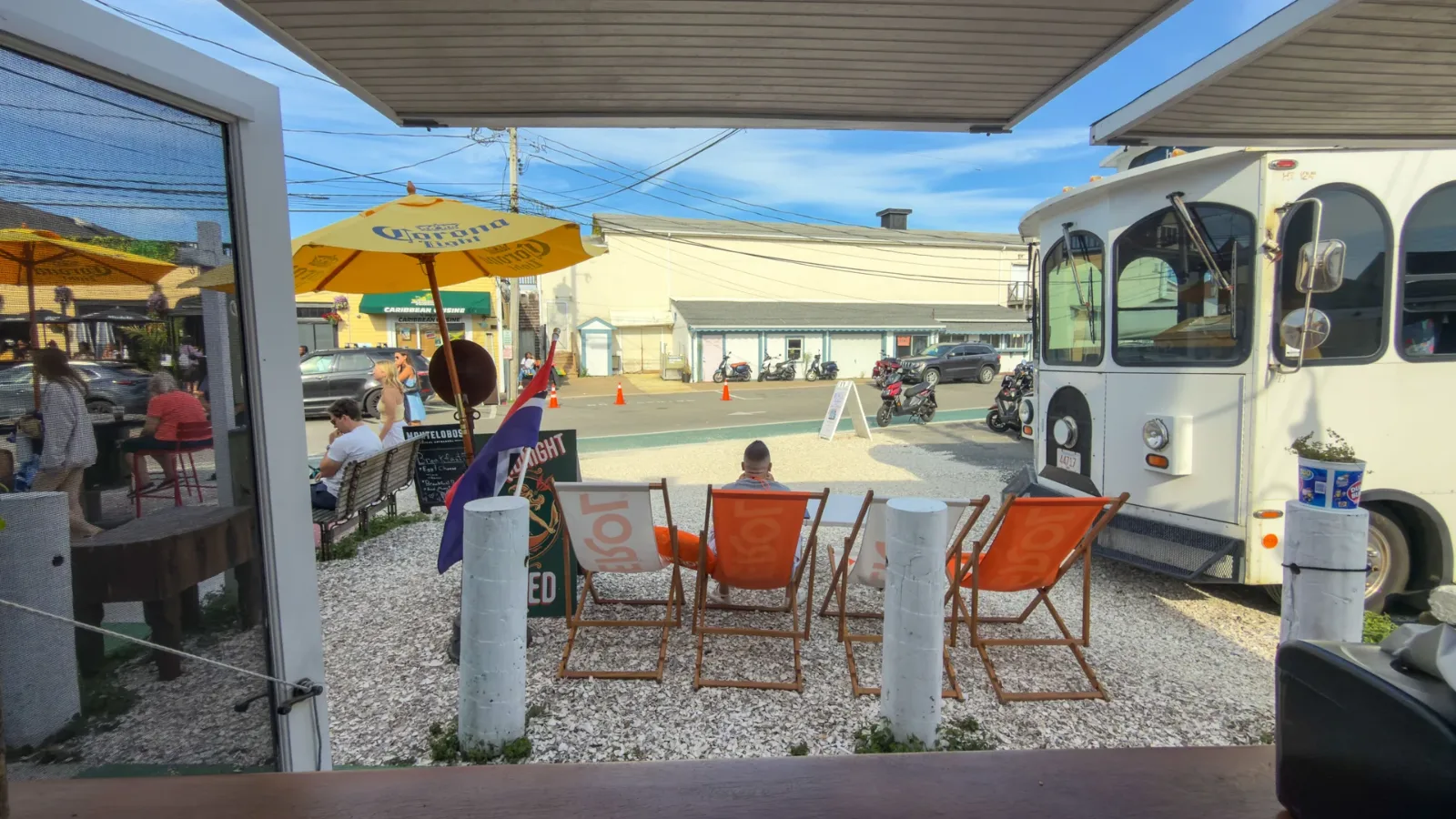 The view out from the takeaway window onto the deck chairs on Circuit Avenue Extension, Oak Bluffs
