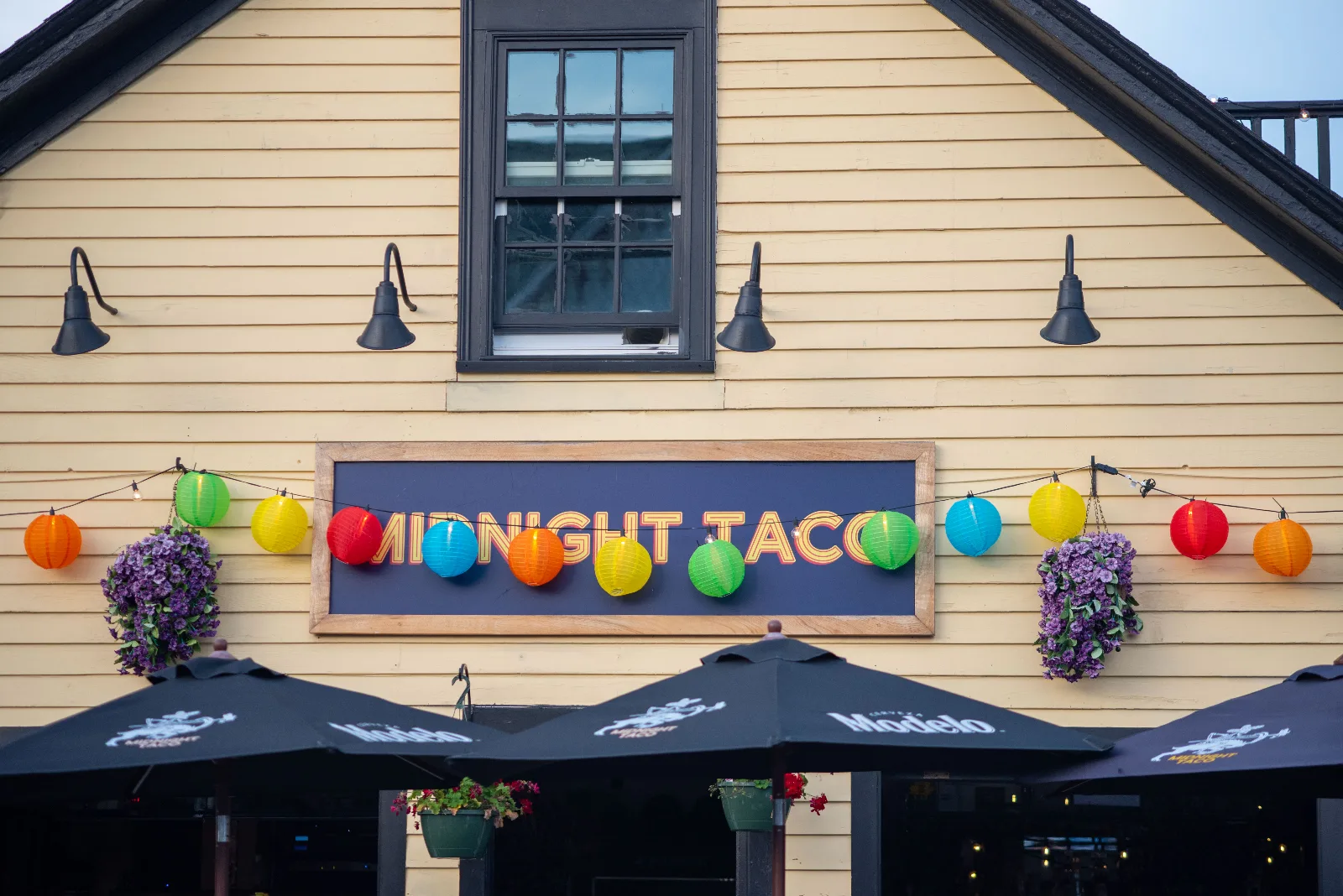 Paper lanterns strung above the Midnight Taco patio, Oak Bluffs