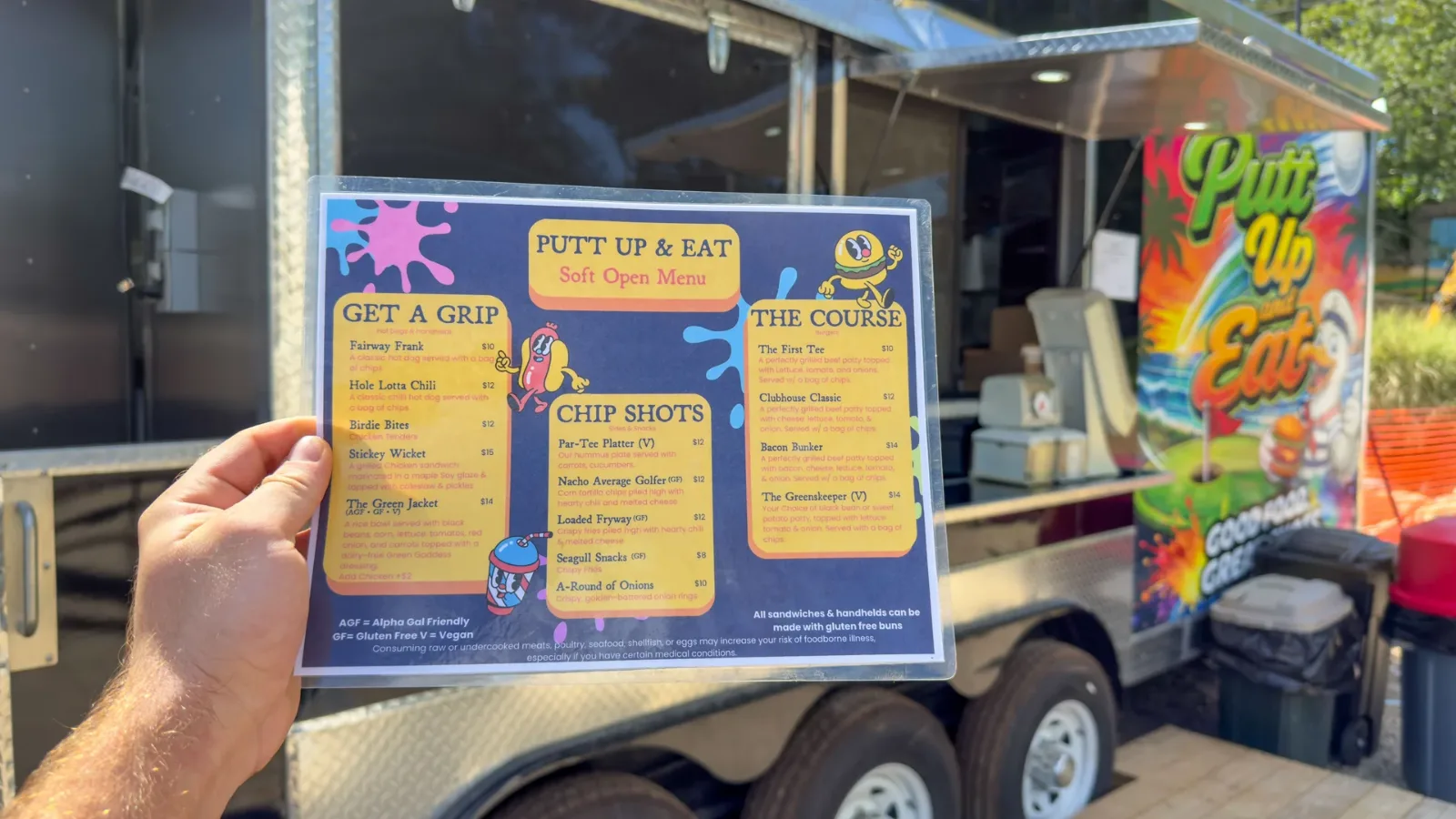 The Putt Up and Eat soft-open menu, photographed August 2026
