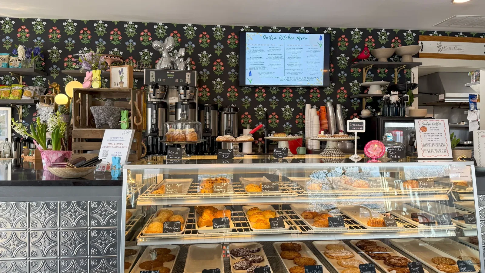 The pastry case and menu screen inside Quitsa Kitchen, State Road, Vineyard Haven