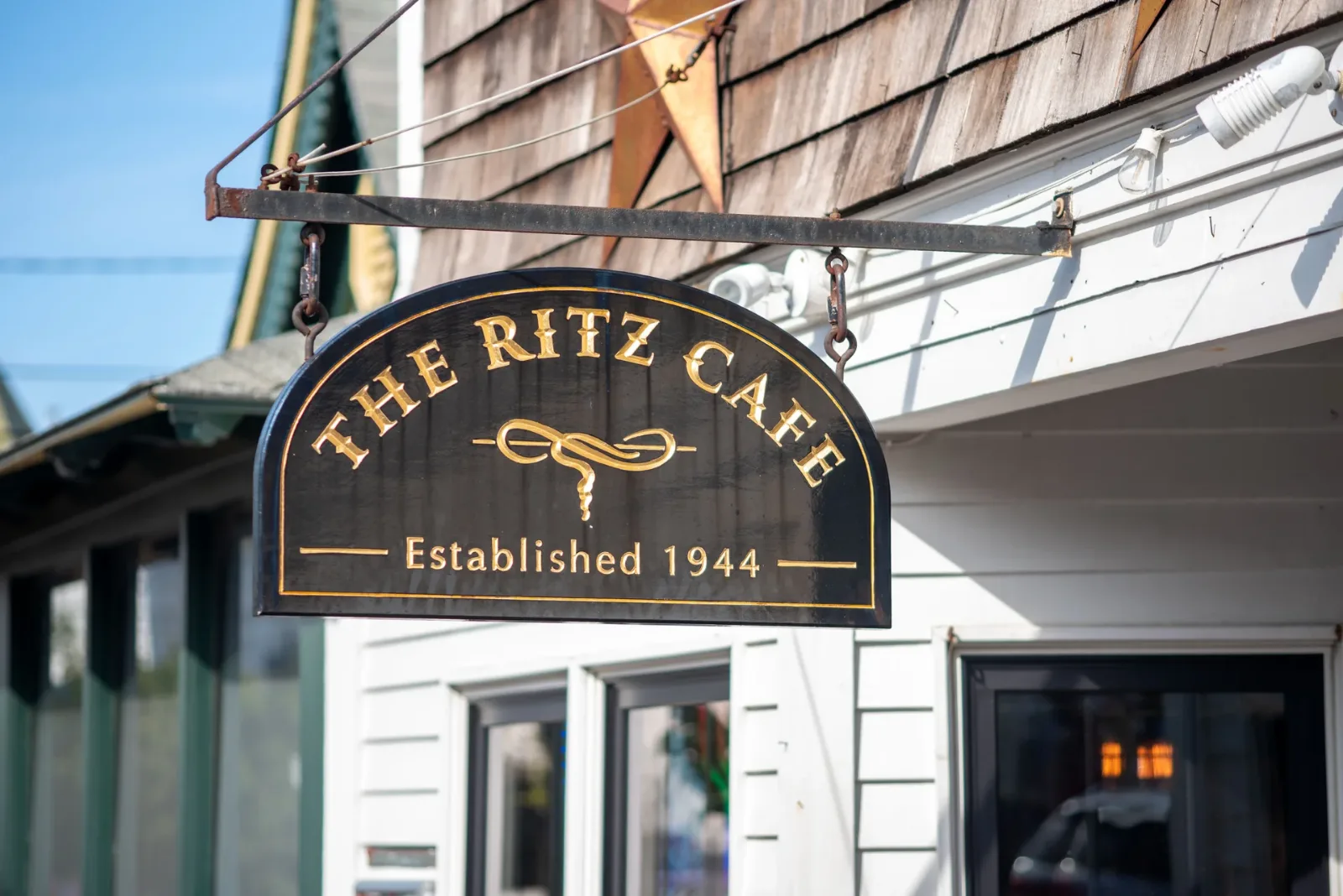 The Ritz Cafe sign against the shingled storefront, Circuit Avenue, Oak Bluffs
